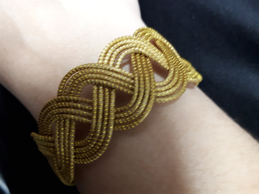 Bracelete capim dourado infinito
